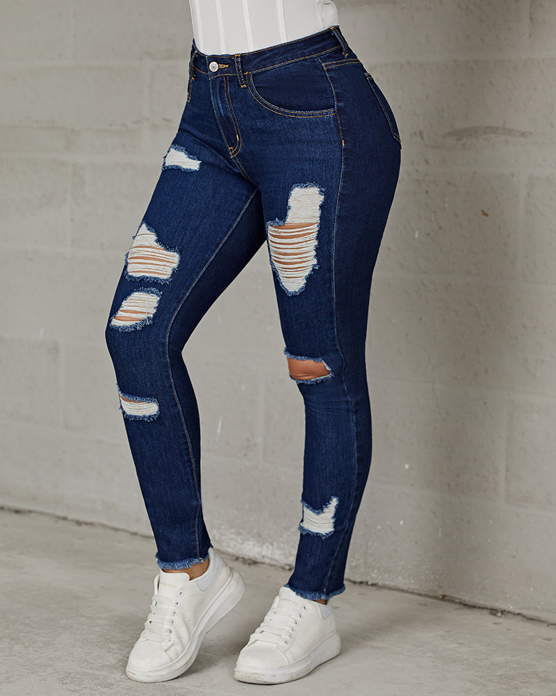 Extreme Distressed Raw Hem Skinny Jeans