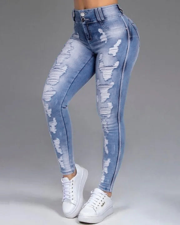 Extreme Distressed Mid Waist Skinny Jeans